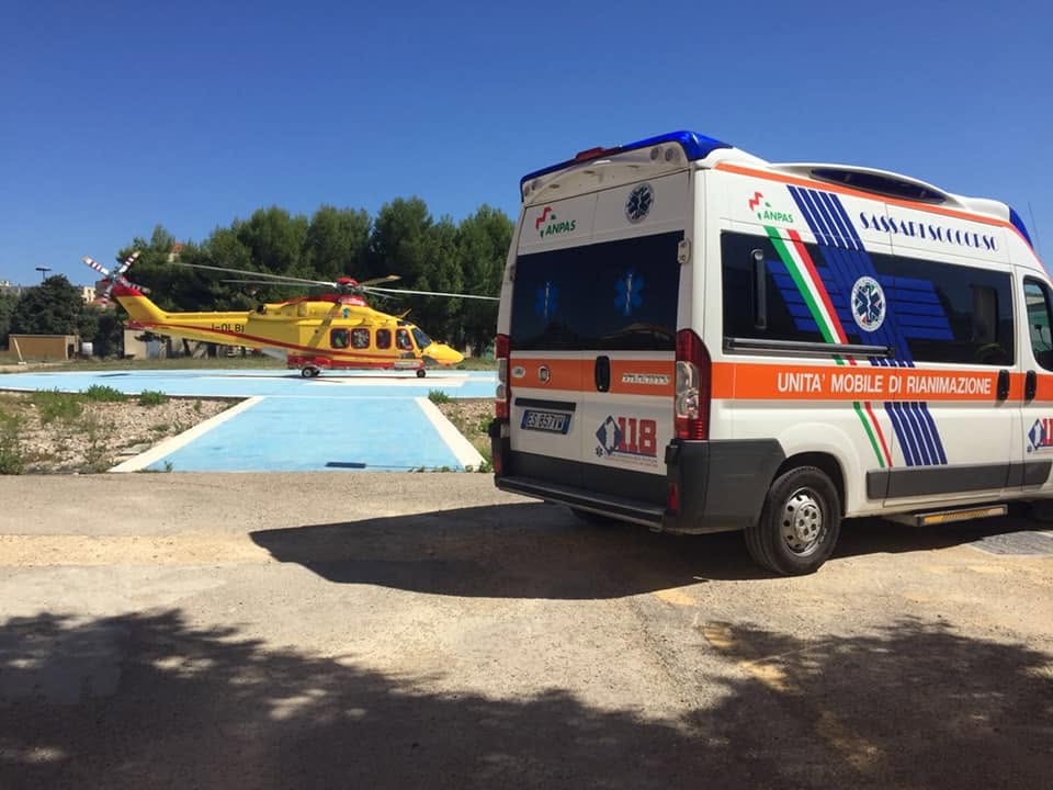 Sassari Soccorso ambulance alongside a rescue helicopter